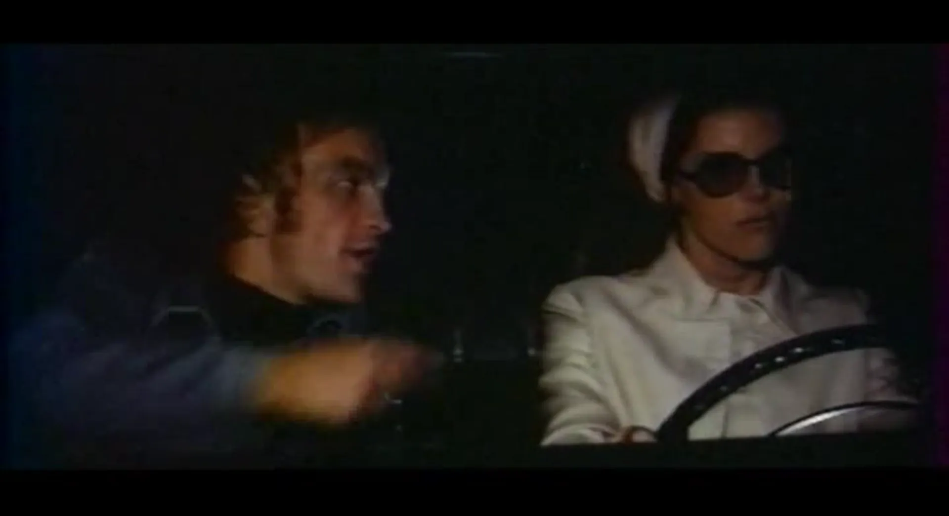 The Lady in the Car with Glasses and a Gun scene still 4