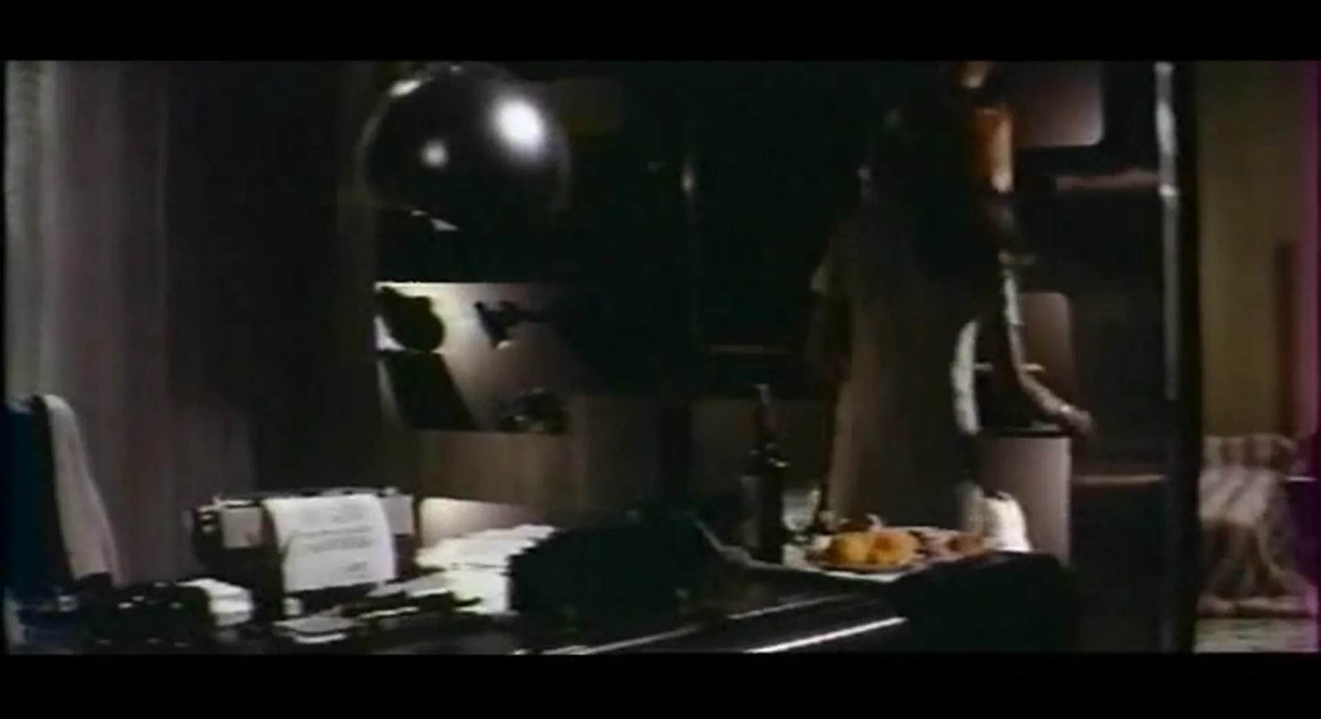 The Lady in the Car with Glasses and a Gun scene still 1