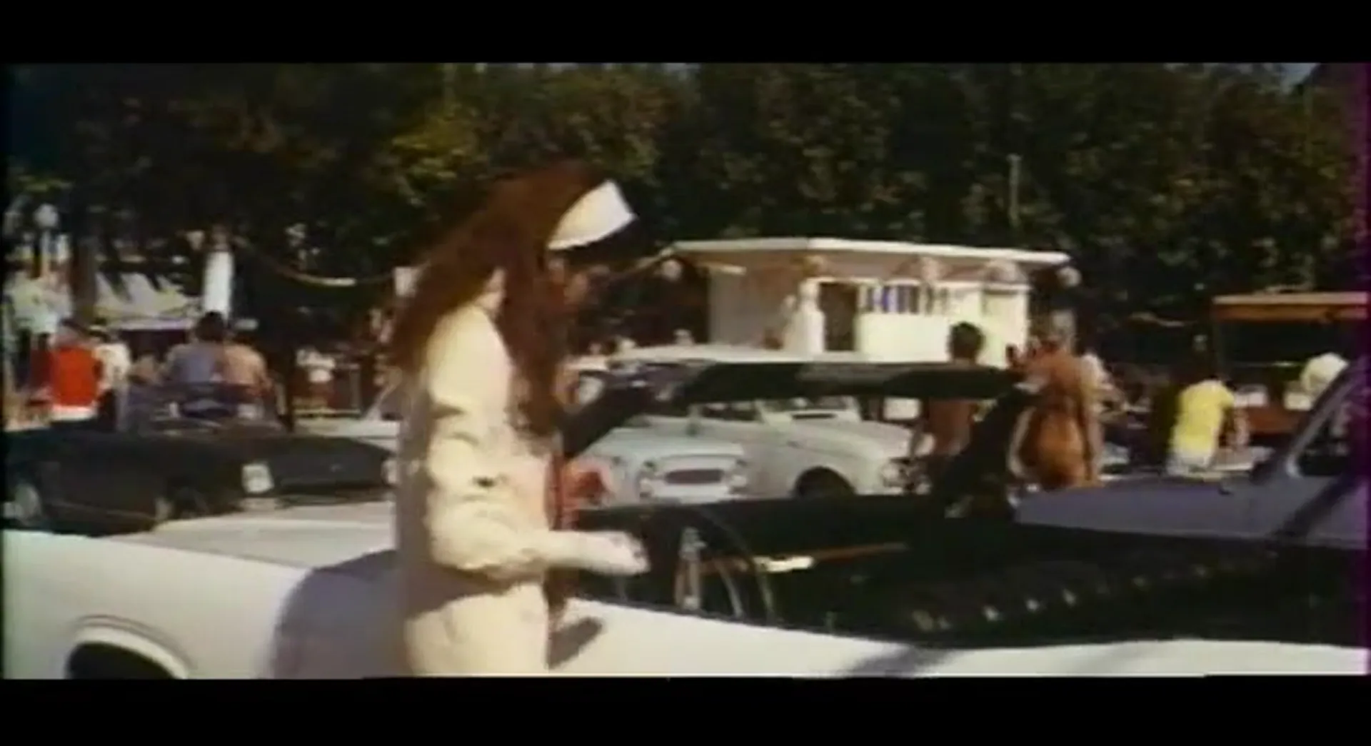 The Lady in the Car with Glasses and a Gun scene still 6
