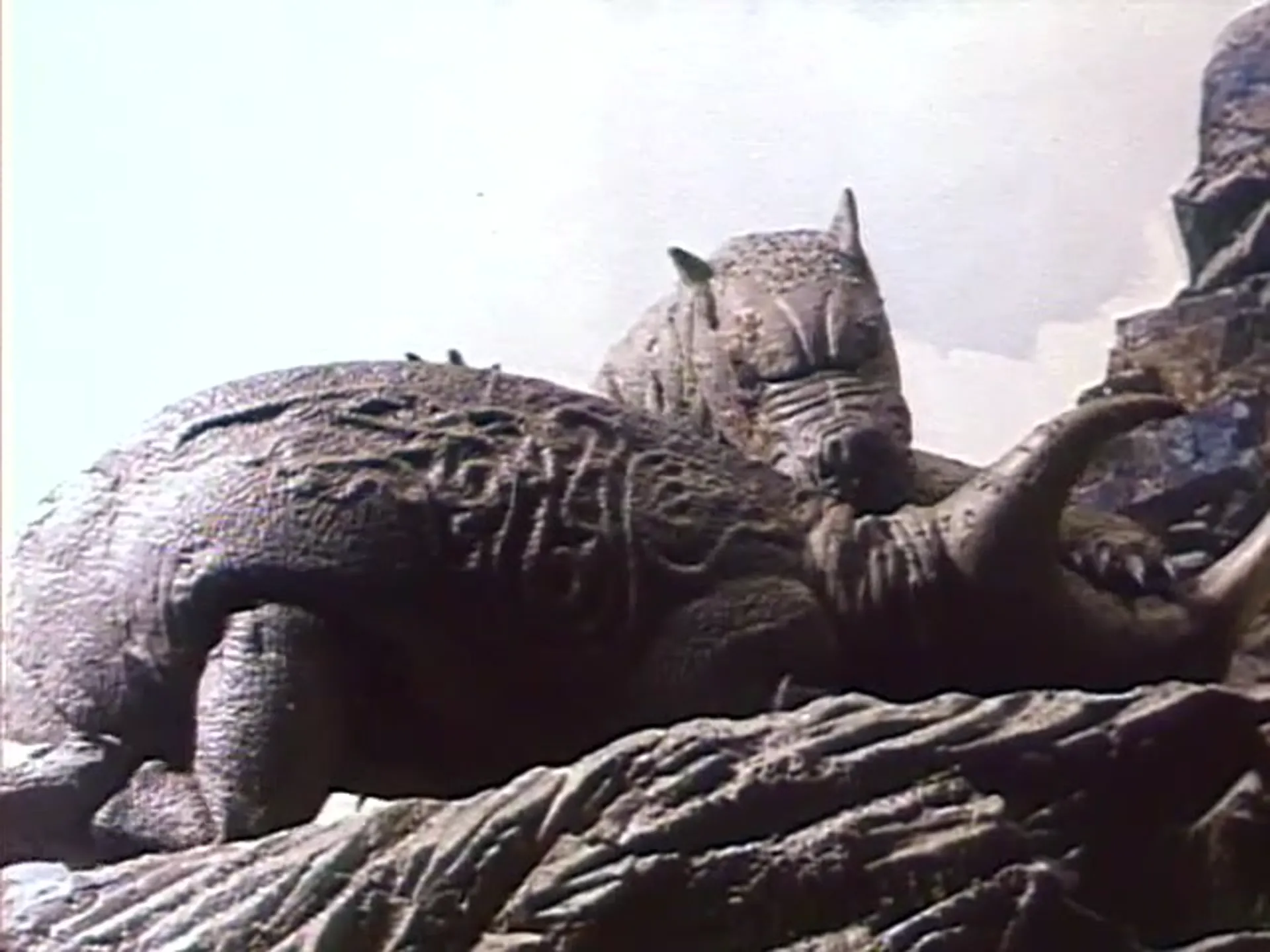 A Nymphoid Barbarian in Dinosaur Hell scene still 6